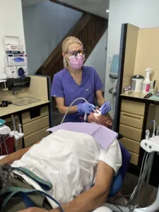 Largo Dentist, Cleaning Patients teeth