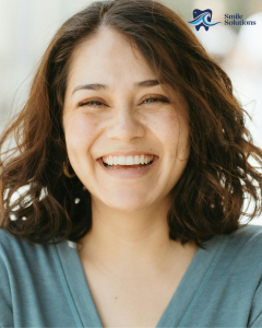 Woman smiling with dermal fillers